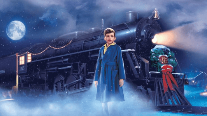 a animated image of a boy infront of a train from The Polar Express movie