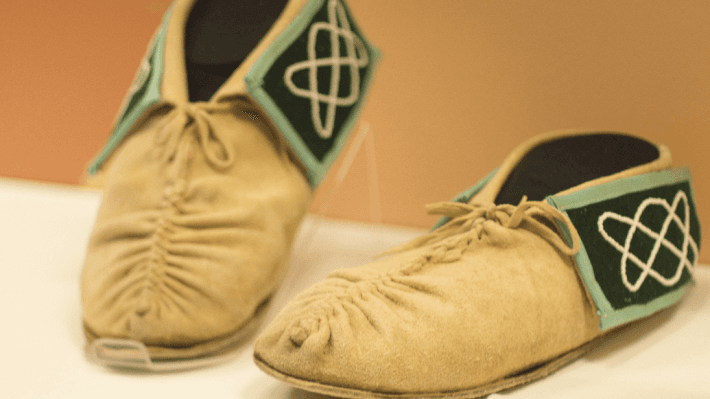 a pair of shoes from the inclusive global histories exhibition 